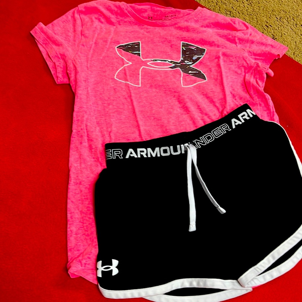 Pink shirt and black shorts